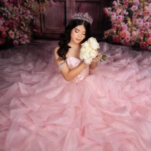 Soft pink ball gown for quinceañera celebration