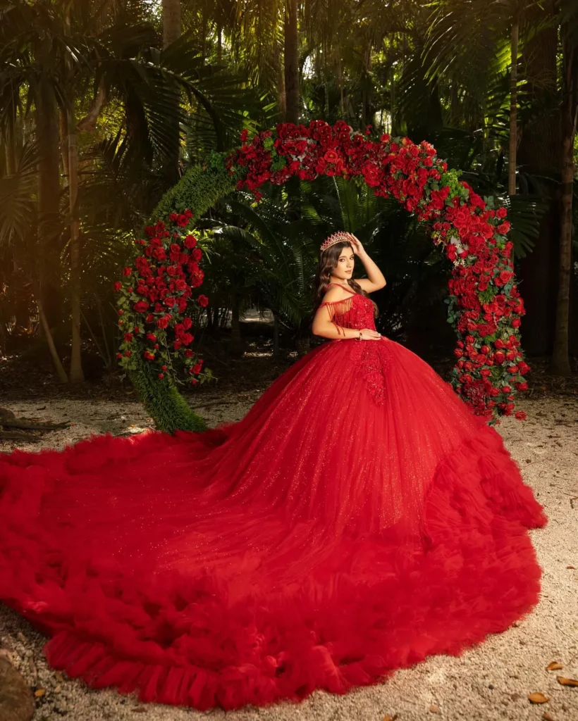 Red lace quinceañera gown with elegant details